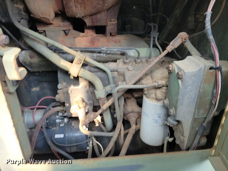 image for item DN3523 1985 Caterpillar 130G MIL motor grader