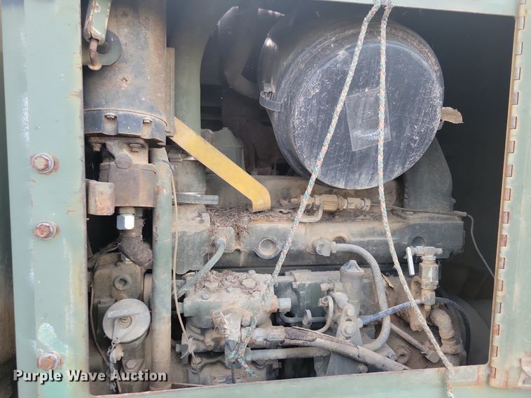 image for item DN3523 1985 Caterpillar 130G MIL motor grader