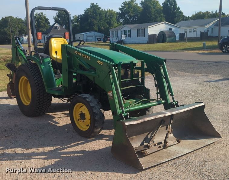 image for item EQ2187 1999 John Deere 4400 MFWD tractor