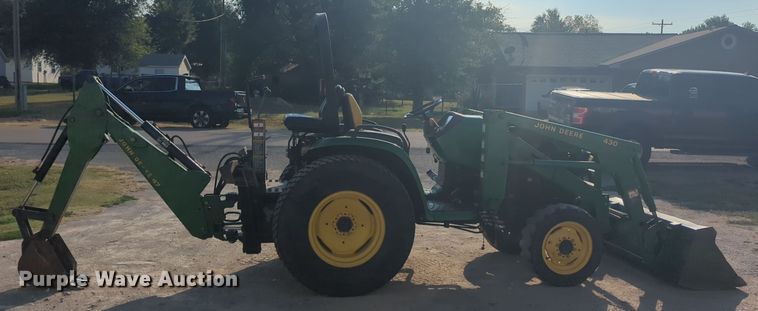 image for item EQ2187 1999 John Deere 4400 MFWD tractor