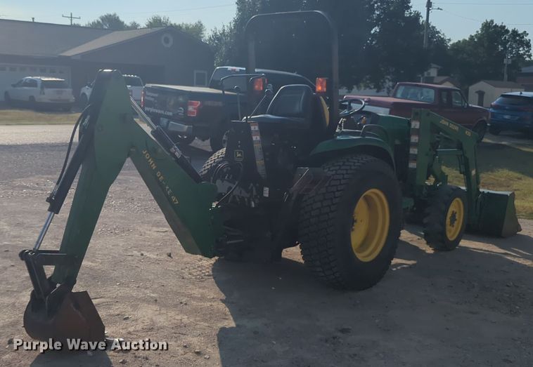 image for item EQ2187 1999 John Deere 4400 MFWD tractor