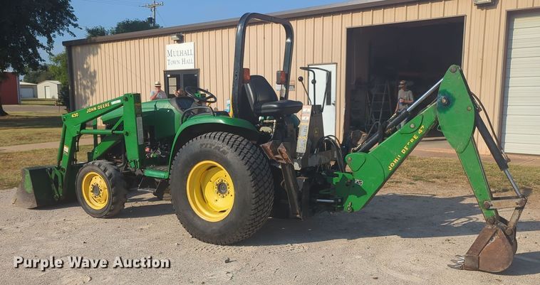 image for item EQ2187 1999 John Deere 4400 MFWD tractor