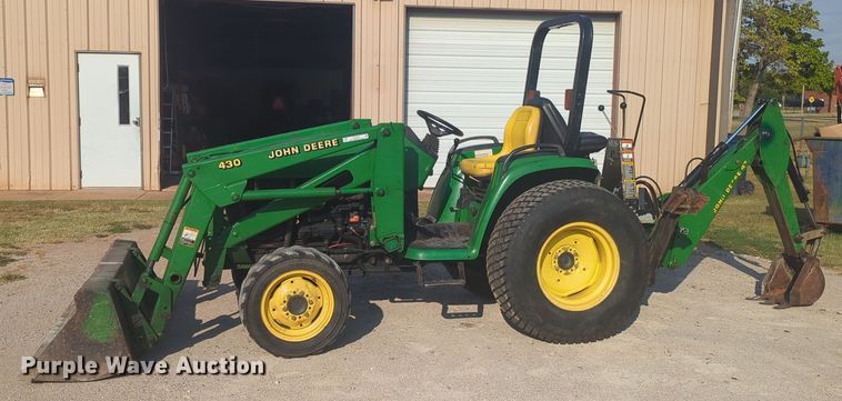 image for item EQ2187 1999 John Deere 4400 MFWD tractor