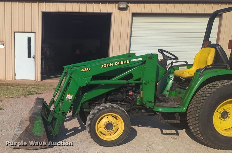 image for item EQ2187 1999 John Deere 4400 MFWD tractor