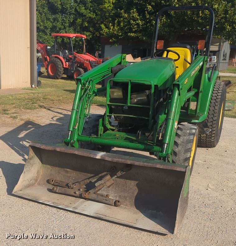 image for item EQ2187 1999 John Deere 4400 MFWD tractor