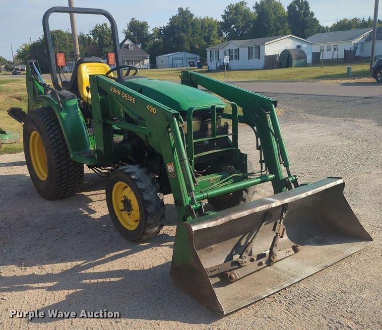 image for item EQ2187 1999 John Deere 4400 MFWD tractor
