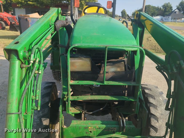 image for item EQ2187 1999 John Deere 4400 MFWD tractor