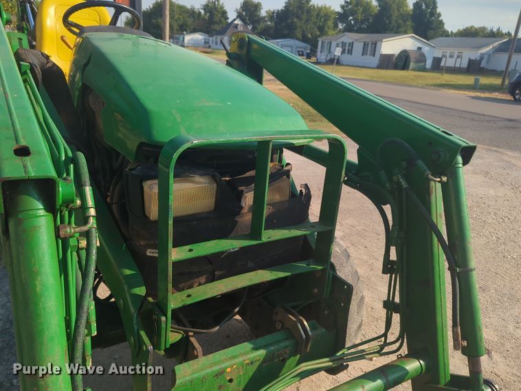 image for item EQ2187 1999 John Deere 4400 MFWD tractor