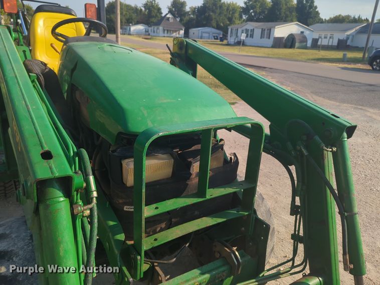 image for item EQ2187 1999 John Deere 4400 MFWD tractor