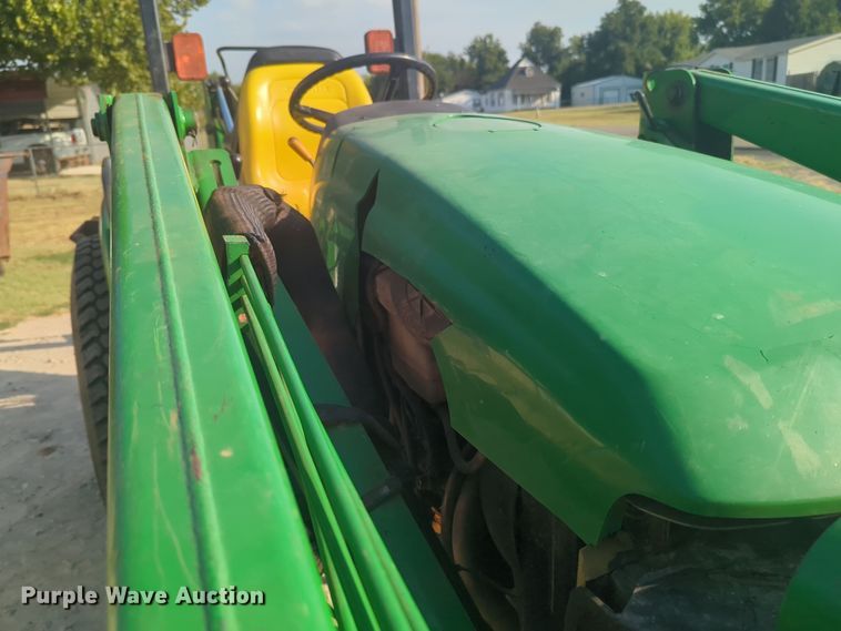 image for item EQ2187 1999 John Deere 4400 MFWD tractor