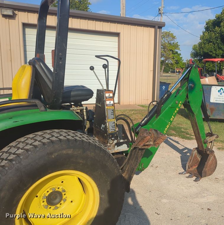 image for item EQ2187 1999 John Deere 4400 MFWD tractor