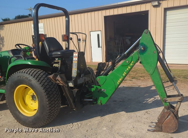 image for item EQ2187 1999 John Deere 4400 MFWD tractor