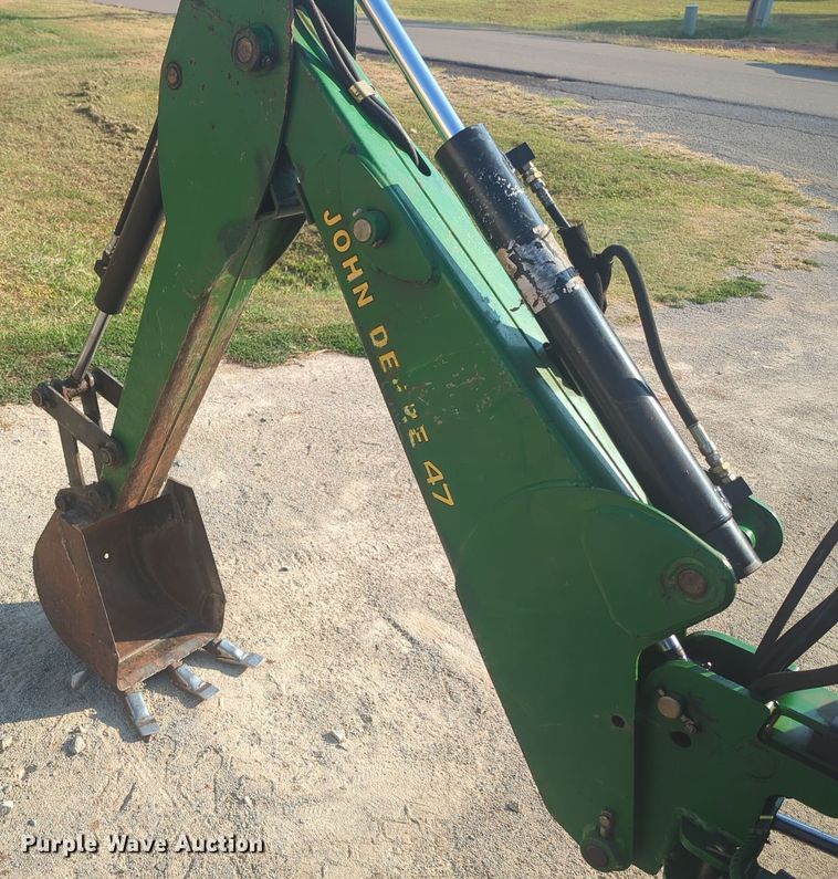 image for item EQ2187 1999 John Deere 4400 MFWD tractor