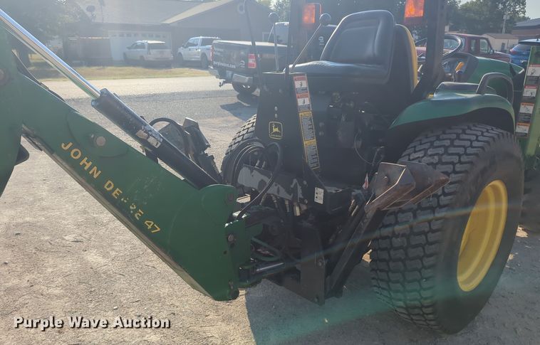 image for item EQ2187 1999 John Deere 4400 MFWD tractor