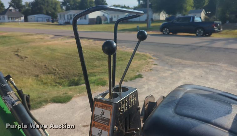 image for item EQ2187 1999 John Deere 4400 MFWD tractor