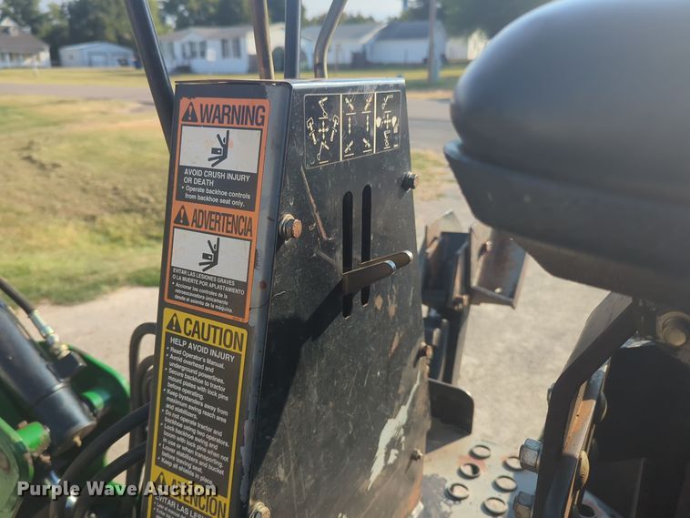 image for item EQ2187 1999 John Deere 4400 MFWD tractor