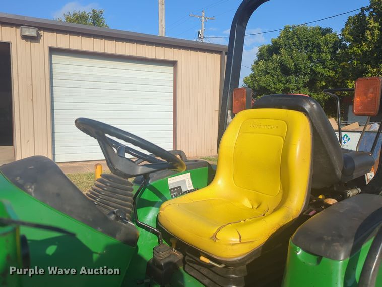 image for item EQ2187 1999 John Deere 4400 MFWD tractor