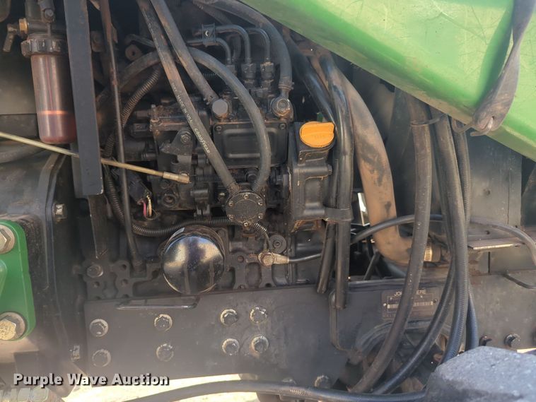 image for item EQ2187 1999 John Deere 4400 MFWD tractor