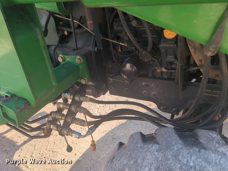 image for item EQ2187 1999 John Deere 4400 MFWD tractor