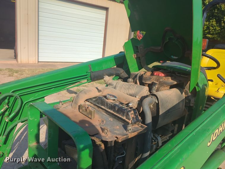 image for item EQ2187 1999 John Deere 4400 MFWD tractor