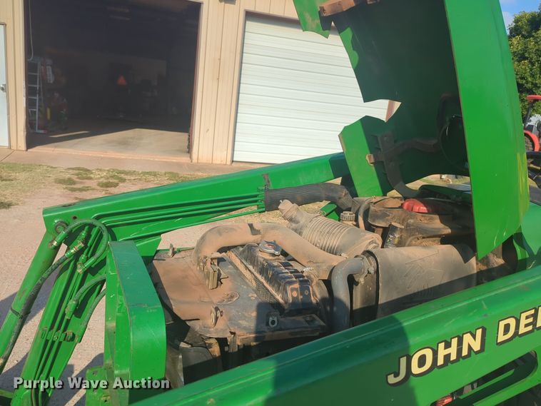image for item EQ2187 1999 John Deere 4400 MFWD tractor