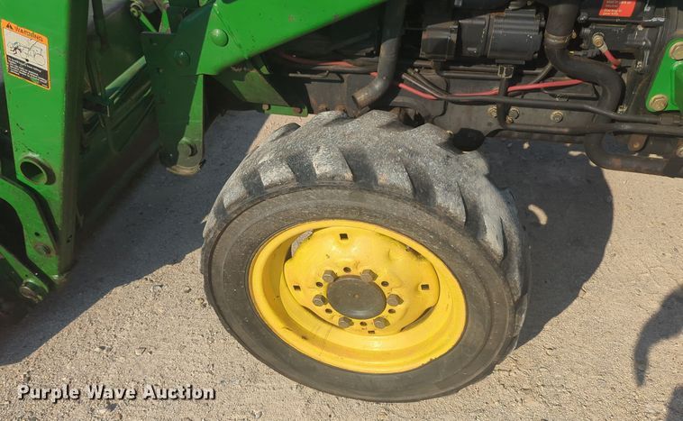 image for item EQ2187 1999 John Deere 4400 MFWD tractor