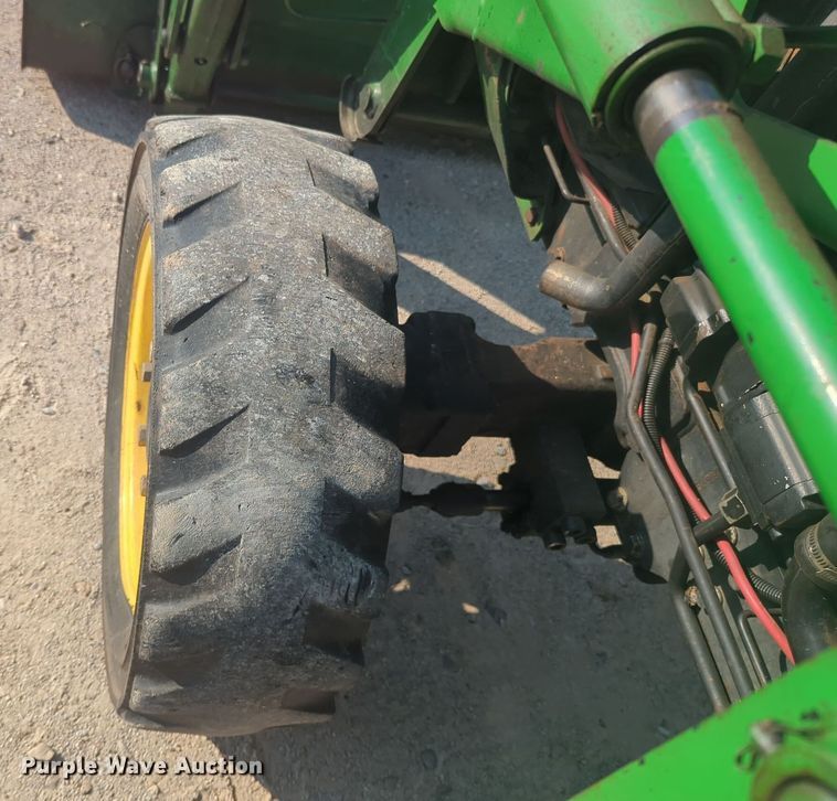 image for item EQ2187 1999 John Deere 4400 MFWD tractor