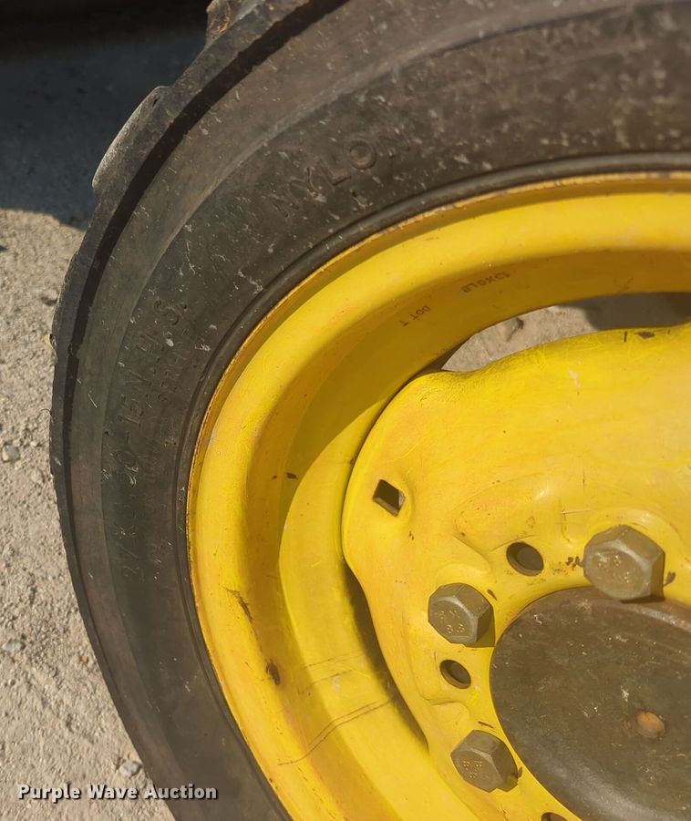 image for item EQ2187 1999 John Deere 4400 MFWD tractor