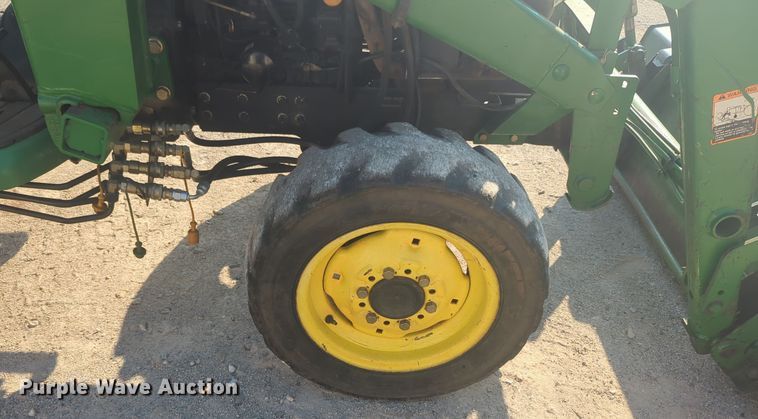 image for item EQ2187 1999 John Deere 4400 MFWD tractor