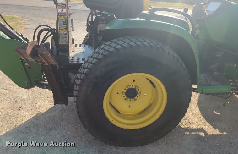 image for item EQ2187 1999 John Deere 4400 MFWD tractor