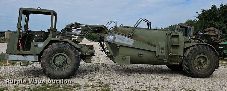 image for item NX9111 1982 Caterpillar  613B water wagon