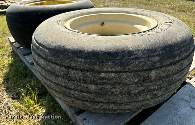 image for item EE7591 (2) 11L-15 tires and wheels