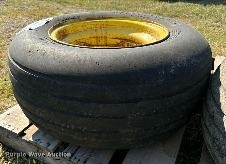 image for item EE7591 (2) 11L-15 tires and wheels