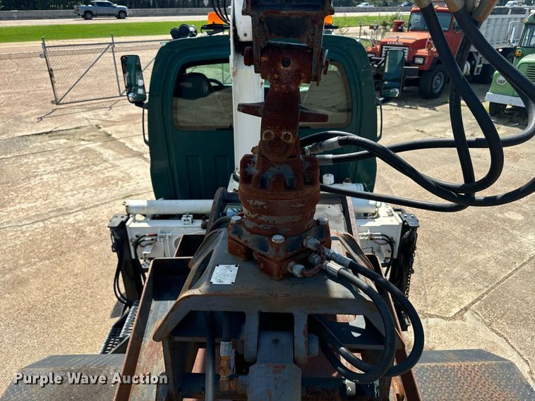 image for item EE7562 2004 GMC 7500 grapple crane truck