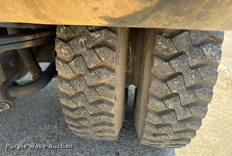 image for item EE7562 2004 GMC 7500 grapple crane truck