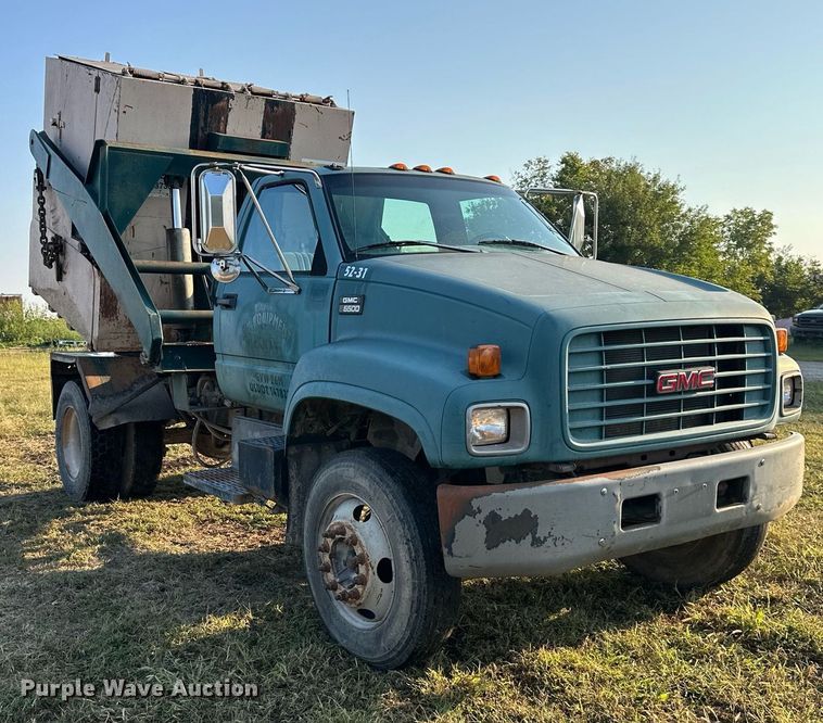 image for item EJ7245 1999 GMC C6500 refuse truck