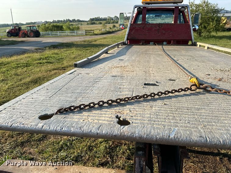 image for item EJ7246 1992 GMC  Topkick C6500 rollback truck