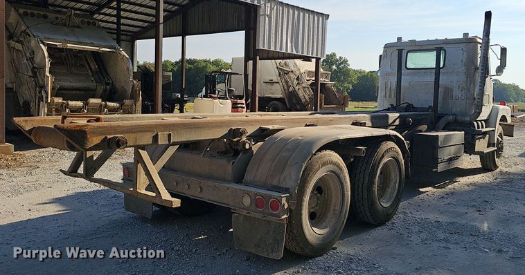 image for item NX9205 1999 Volvo WG roll-off container truck