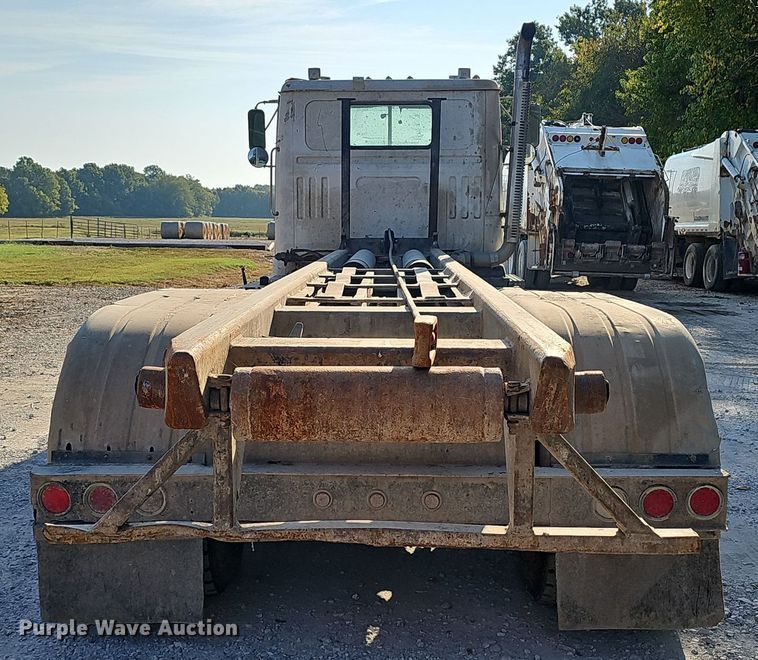 image for item NX9205 1999 Volvo WG roll-off container truck