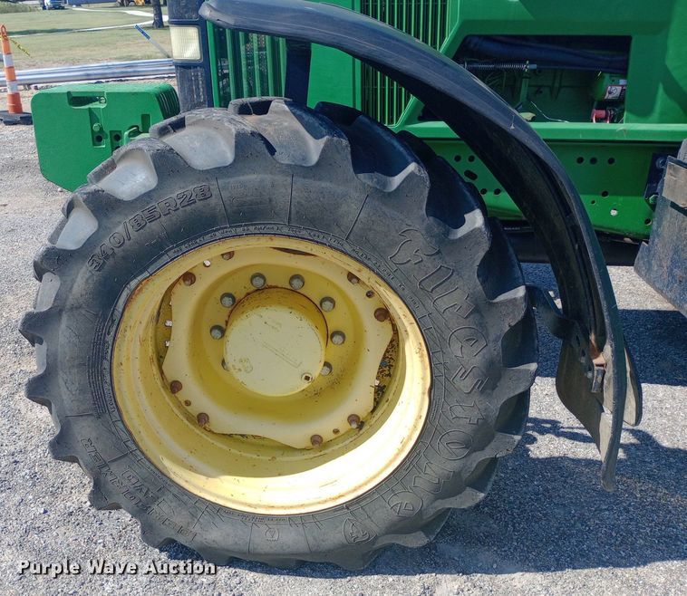 image for item DH1261 1999 John Deere 7210 MFWD tractor