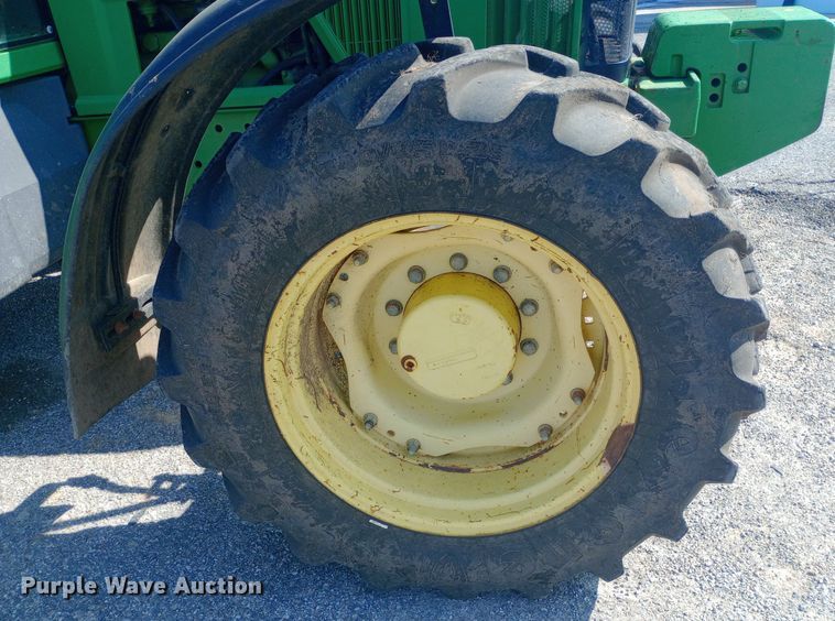 image for item DH1261 1999 John Deere 7210 MFWD tractor