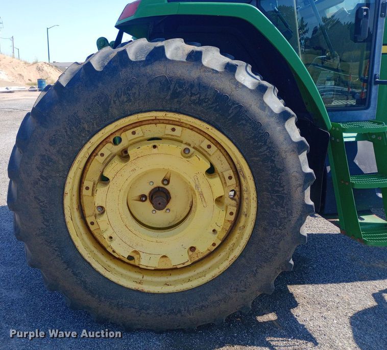 image for item DH1261 1999 John Deere 7210 MFWD tractor