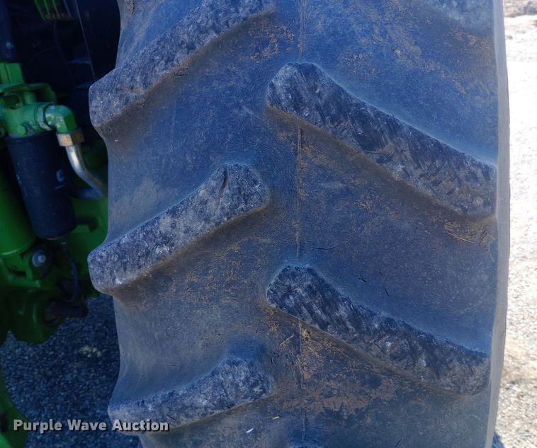 image for item DH1261 1999 John Deere 7210 MFWD tractor