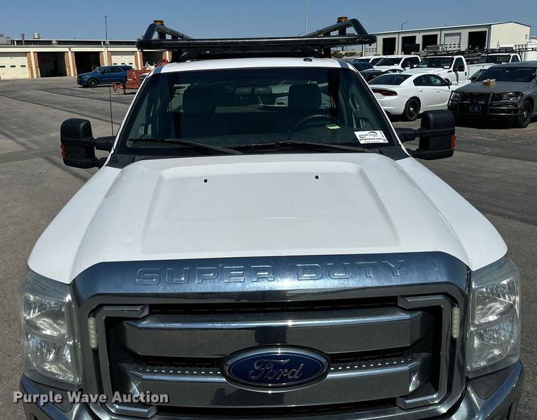 image for item DH1263 2016 Ford F250 Super Duty XLT utility bed pickup truck