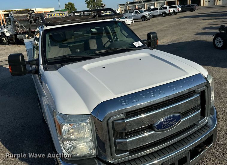 image for item DH1273 2014 Ford F250 Super Duty XLT utility bed pickup truck