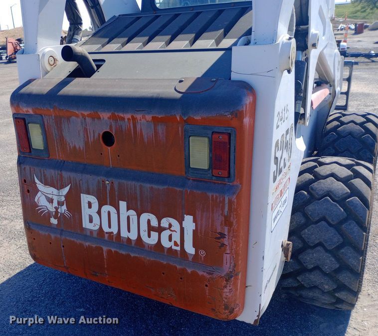 image for item DH1328 2005 Bobcat S250 skid steer loader