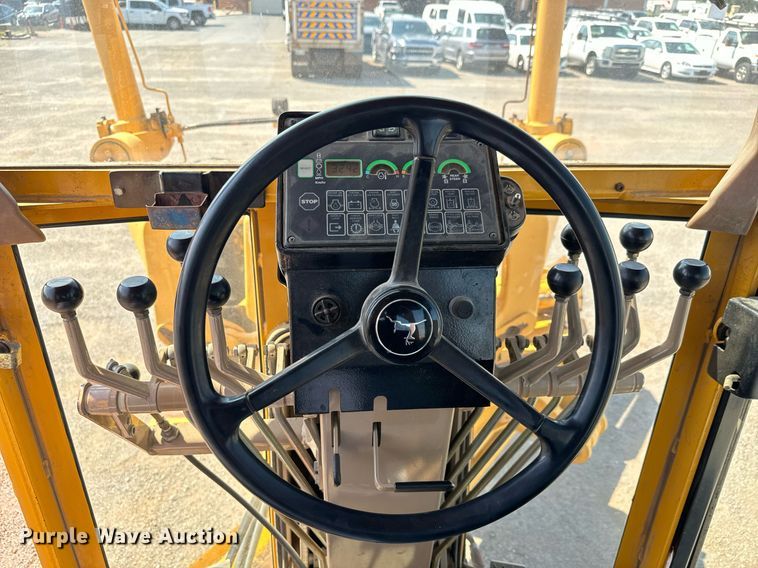 image for item DO1703 2001 John Deere  772CH motor grader