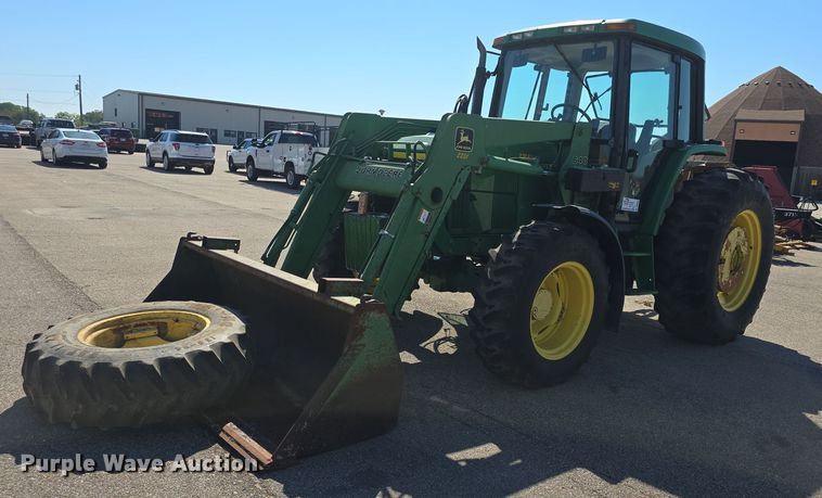 image for item DQ4605 1998 John Deere  6310 MFWD tractor