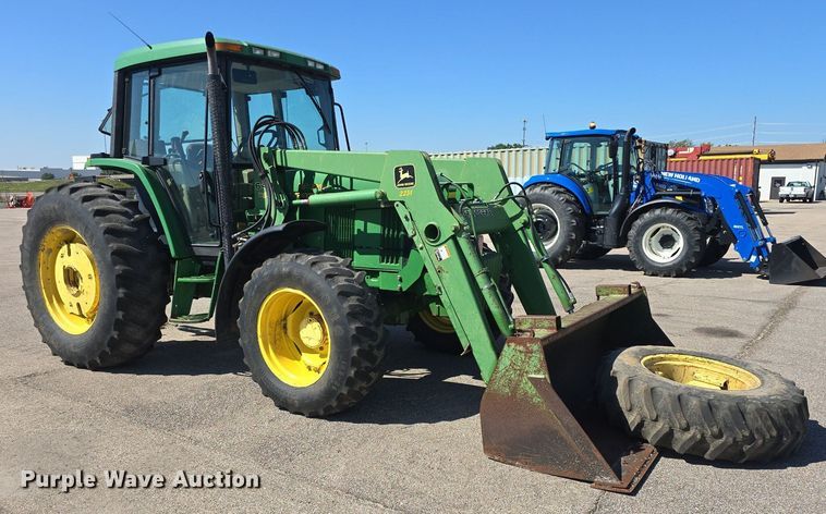 image for item DQ4605 1998 John Deere  6310 MFWD tractor