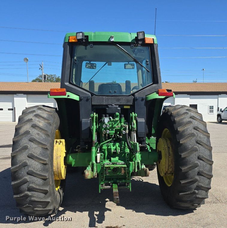image for item DQ4605 1998 John Deere  6310 MFWD tractor